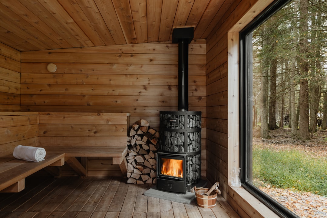 Wooden sauna interior with stove