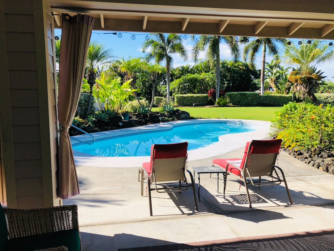 Poolside terrace with lounge chairs