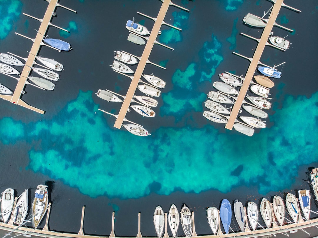 Aerial view of a marina with docked yachts